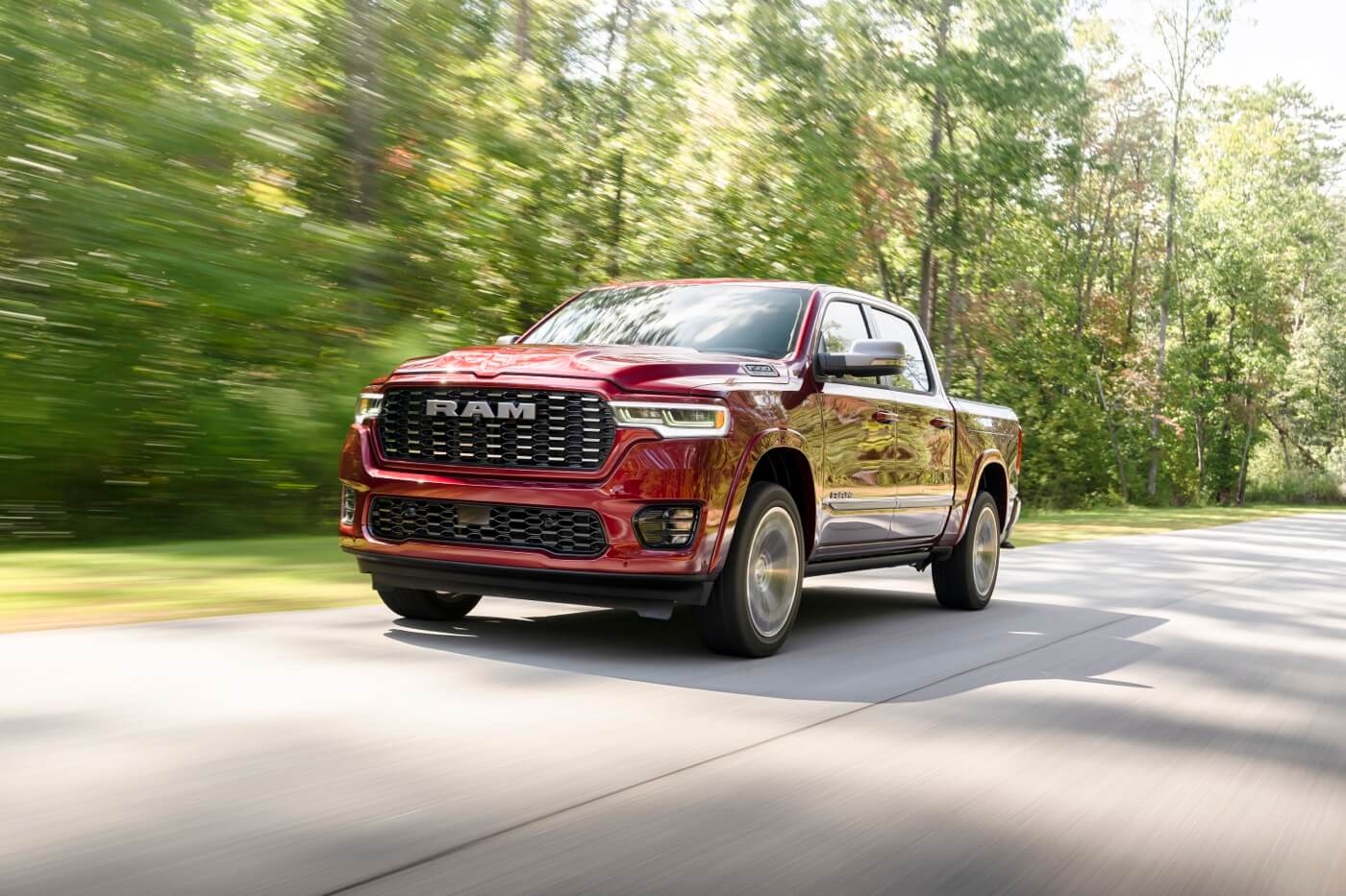 Front 3/4 view of the 2025 RAM 1500 on the road.